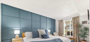 4 bedrooms, desk, iron/ironing board, travel crib