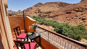 Comfort Quadruple Room, Balcony, Garden View | Terrace/patio