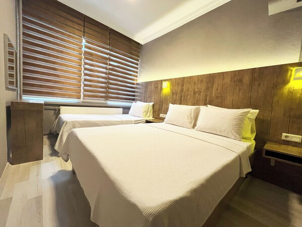 Doppel- oder Zweibettzimmer | Schreibtisch, kostenloses WLAN, Bettwäsche