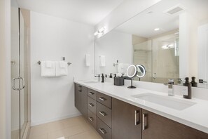 Shower, eco-friendly toiletries, hair dryer, towels