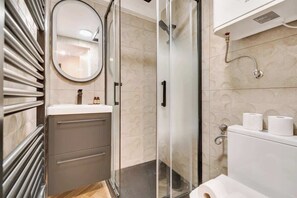 Shower, hair dryer, shampoo
