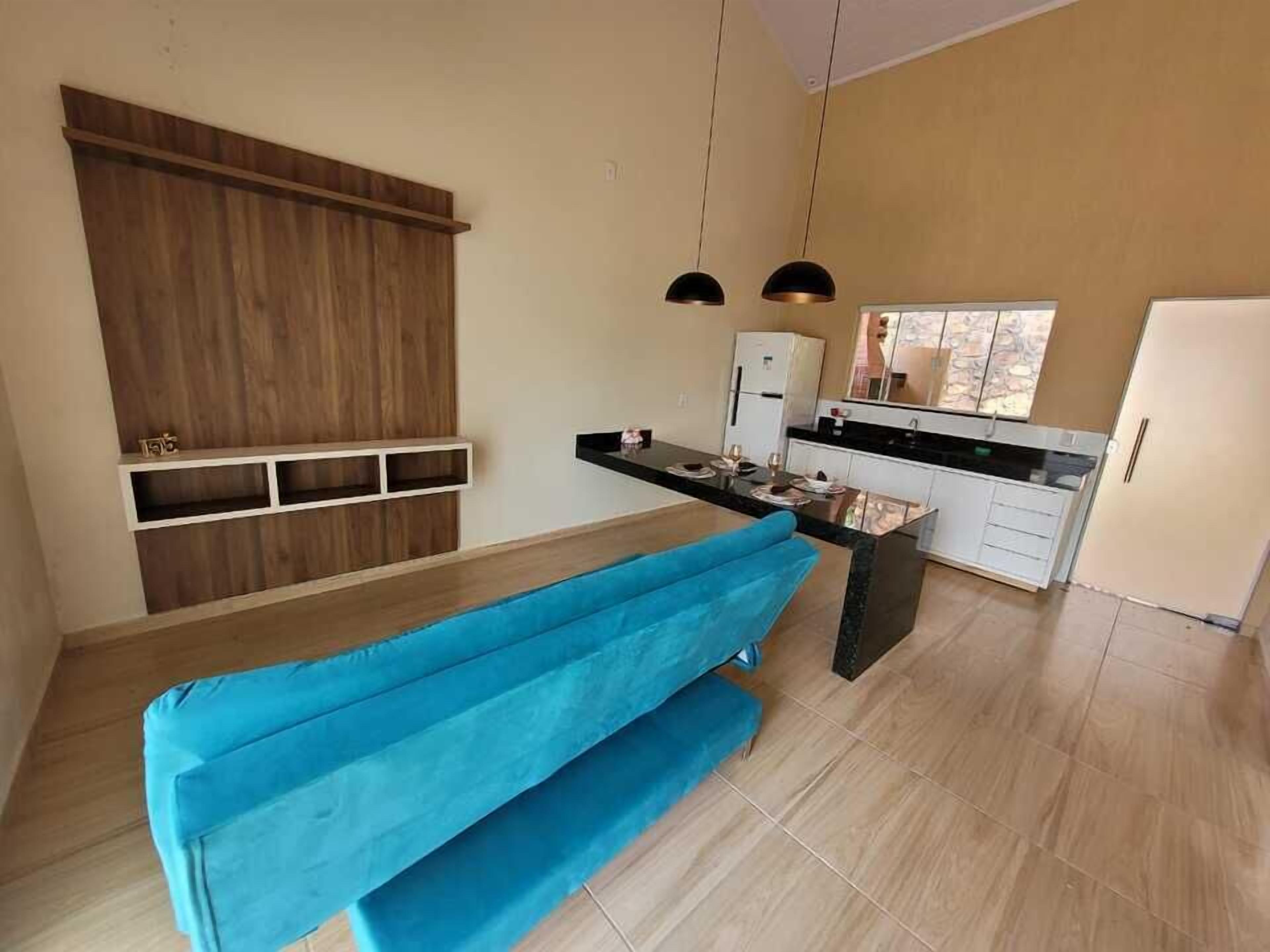 Orchid Cottage - View of the Itiquira Falls | Living area | 32-inch Smart TV with cable channels, toys