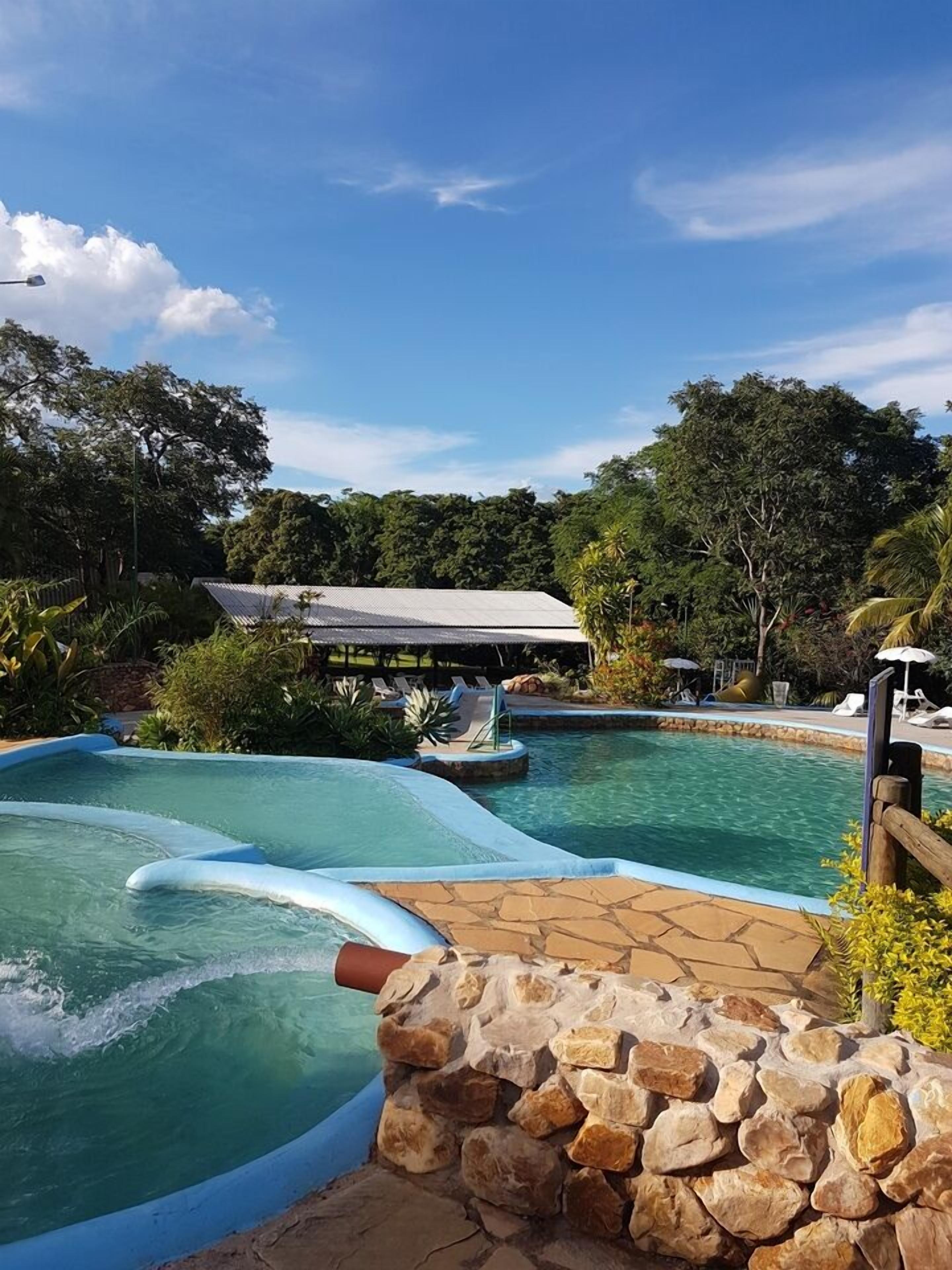 Indoor pool, 3 outdoor pools, open 9:00 AM to 10:00 PM, pool umbrellas