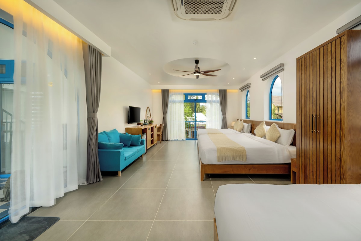 Family Studio Suite, Multiple Beds, Balcony, City View | Minibar, in-room safe, desk, laptop workspace