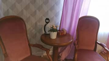 Comfort-Doppel- oder -Zweibettzimmer, Gartenblick | Wohnbereich