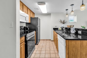 Signature Condo, 2 Bedrooms, Beach View, Beachfront | Private kitchen | Fridge, microwave, oven, stovetop