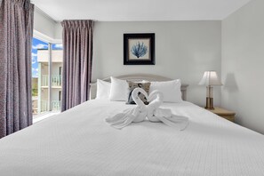 Signature Condo, 2 Bedrooms, Beach View, Beachfront | Individually decorated, individually furnished, laptop workspace