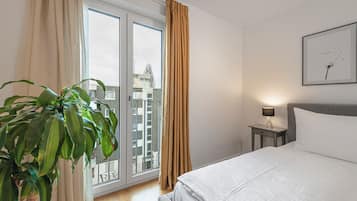 2 dormitorios, escritorio, tabla de planchar con plancha y wifi gratis