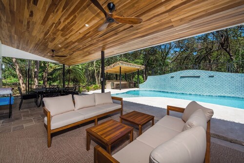 Super lux 5-bedroom, 7 bath house in beautiful Playa Grande with golf cart!