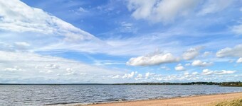 Serene Lakehouse With Rowing Boat