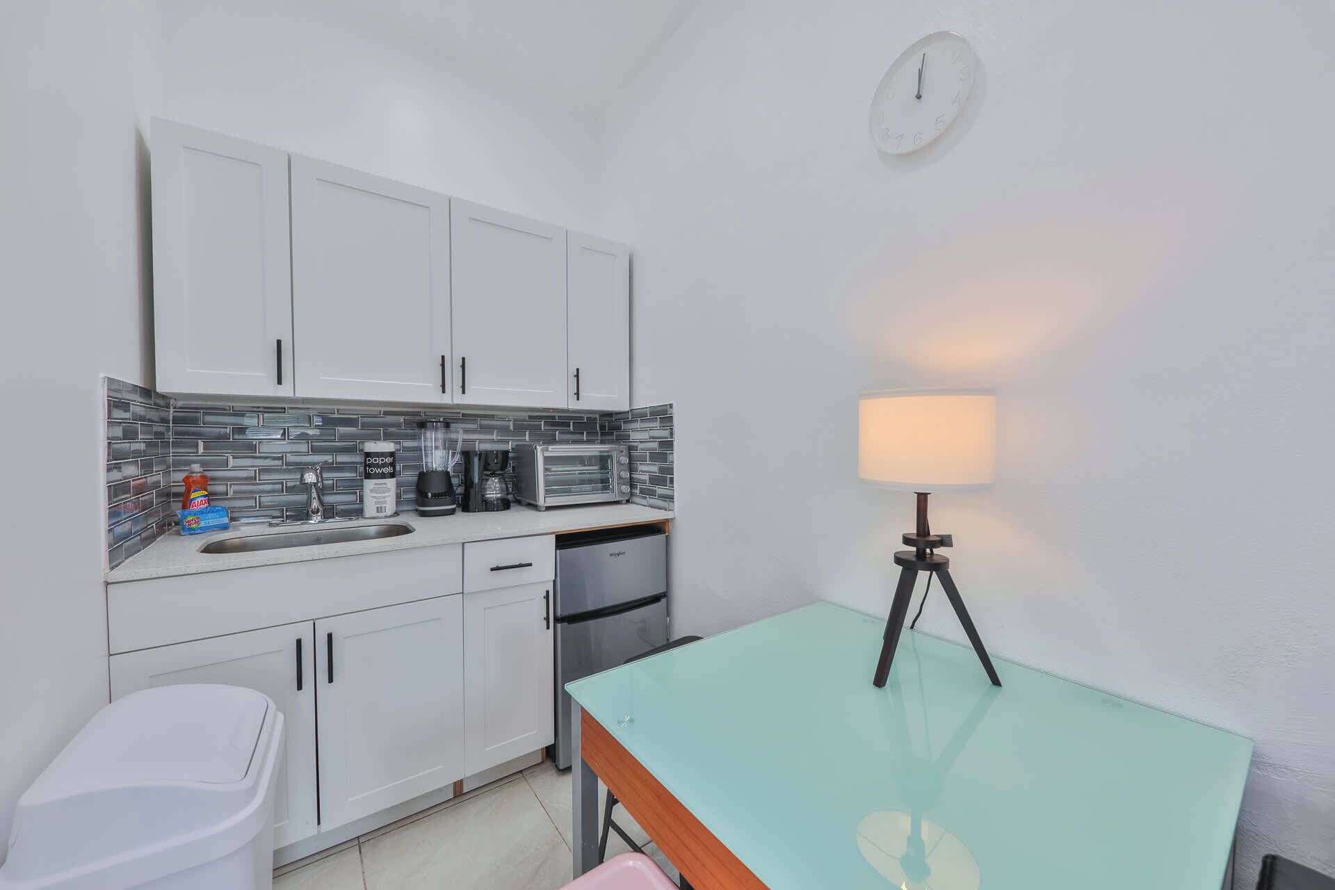 Fridge, oven, coffee/tea maker, toaster