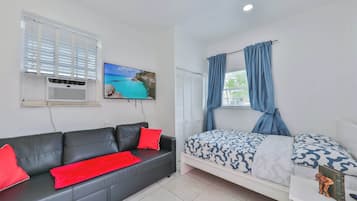 Desk, iron/ironing board, travel cot, free WiFi