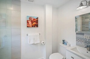 Hair dryer, towels, soap, shampoo