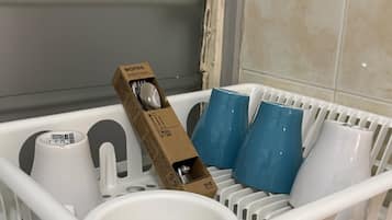 Shower, hair dryer, towels, toilet paper