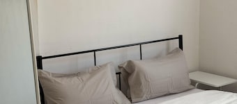 Entire unit 2-bedroom apartment town area with AC, WiFi