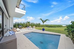 Outdoor pool, a heated pool - 4-bedroom oceanfront villa in Melbourne Beach with (Melbourne Beach)