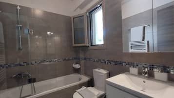 Hair dryer, towels, soap, toilet paper