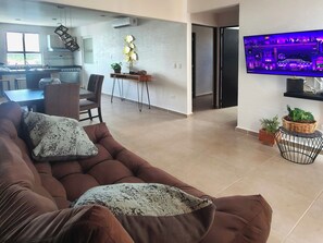 Appartement Standard, vue jardin | Coin séjour
