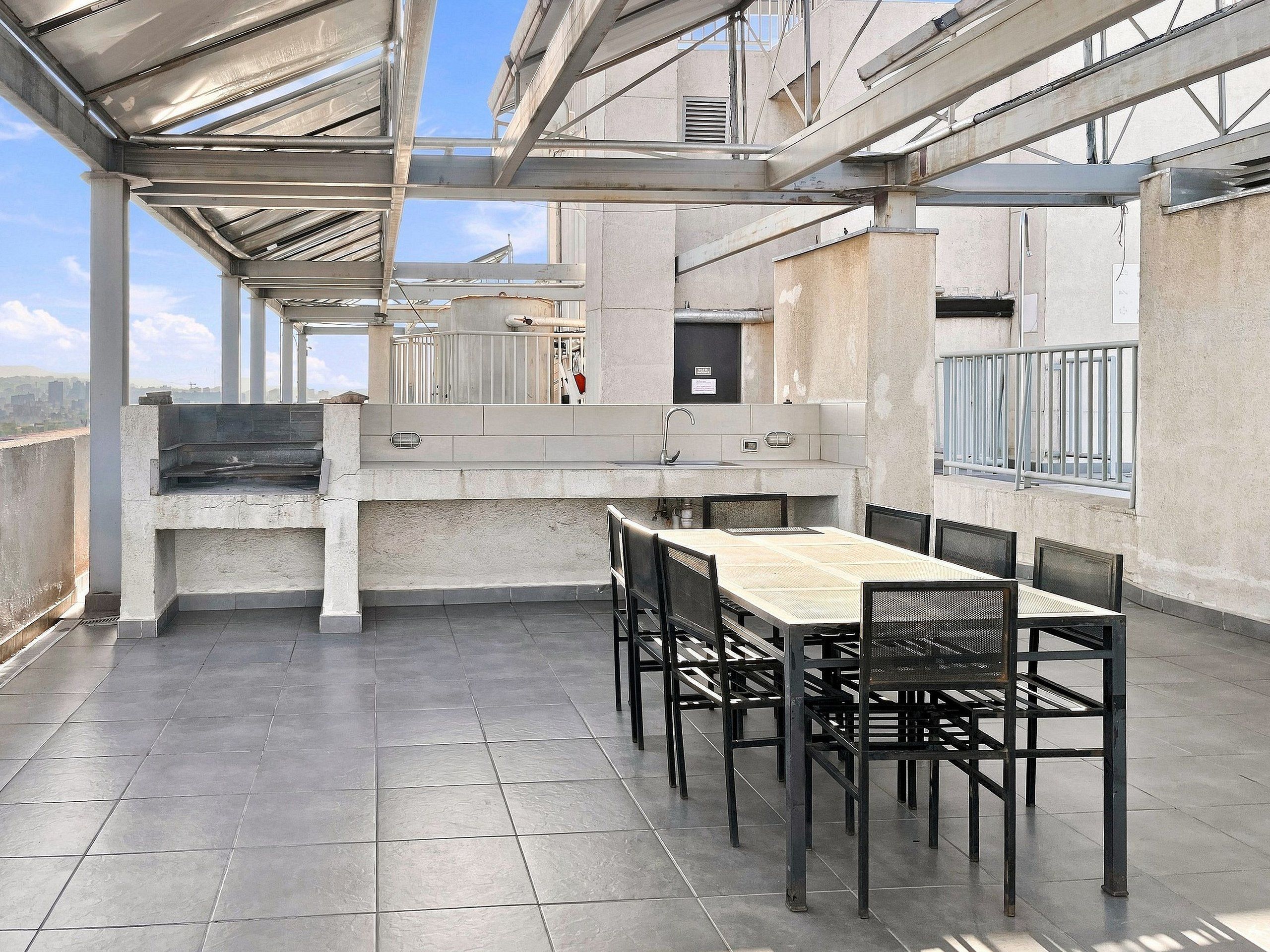 Apartamento | Restaurante al aire libre