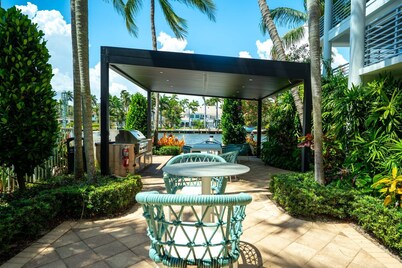 Waterfront Oasis 2BR/2BA with Pool, Gym, Balcony & Parking