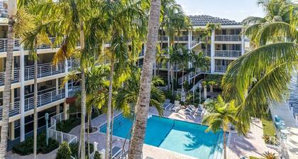 Waterfront Oasis 2BR/2BA with Pool, Gym, Balcony & Parking