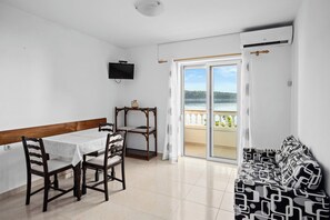 Apartment | Private kitchen - Coastal Comfort With Balcony (Rab)