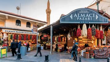 A market with a sign reading "ALMACI PAZARI 2014".