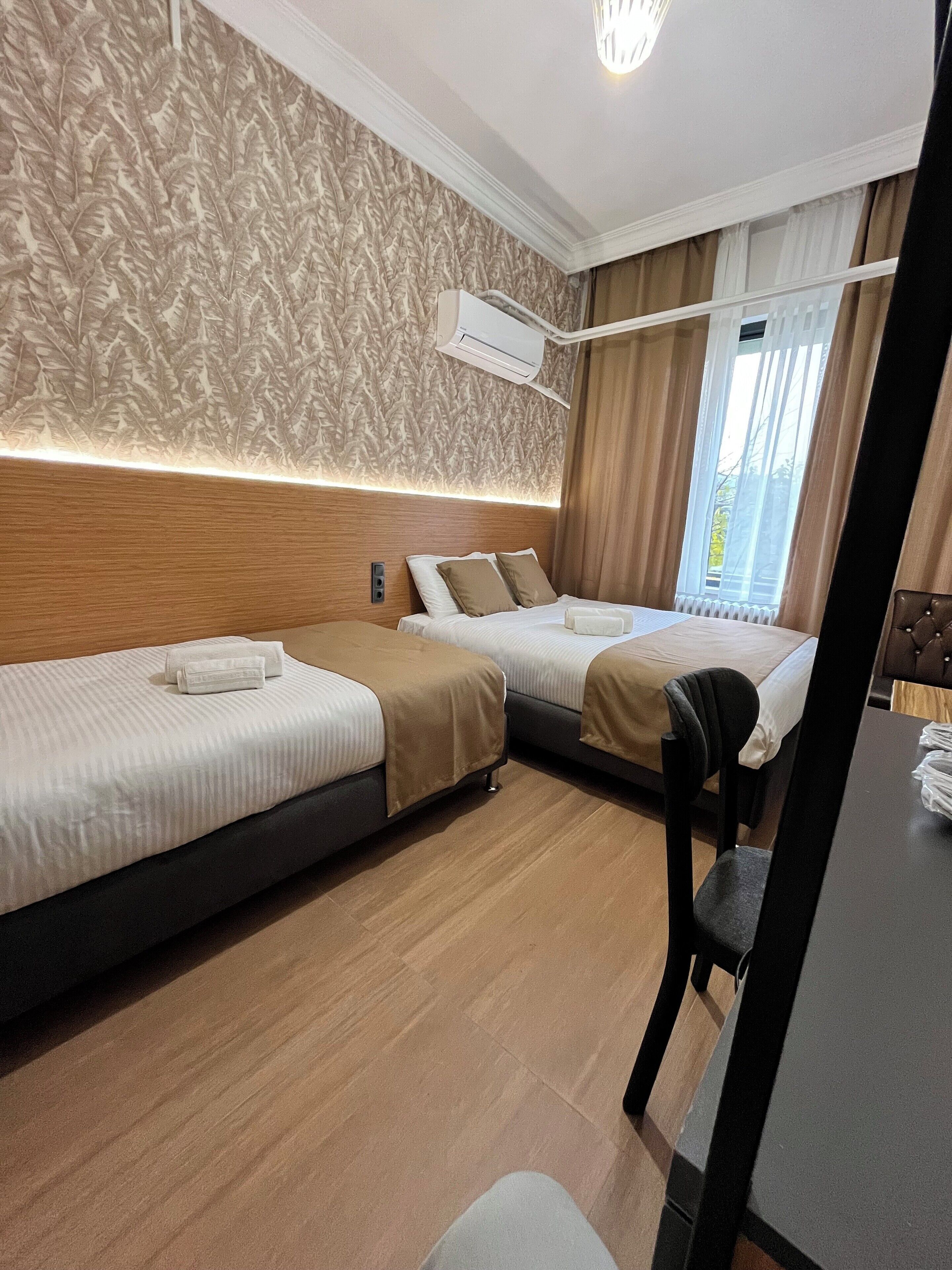 家庭开间 | 高档床上用品、办公桌、免费 WiFi、床单