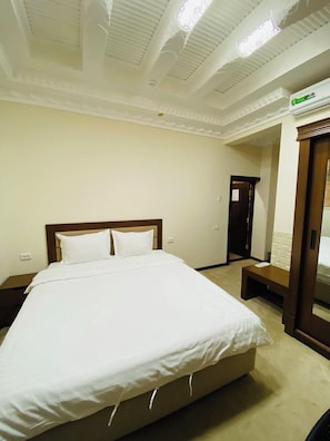 Deluxe Double or Twin Room, 1 Bedroom, Courtyard View | Soundproofing, iron/ironing board - Orbita Villa (Bukhara)