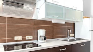 Appartement | Cuisine privée | Chaise haute
