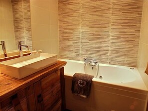 Jetted bath, hair dryer, towels, soap