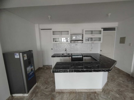 Private kitchen. Apartment excellent location in the beautiful city of Huanuco