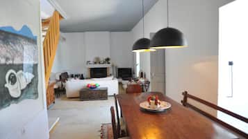 Family Apartment, 3 Bedrooms, Mountain View | Living area | 40-cm TV with digital channels