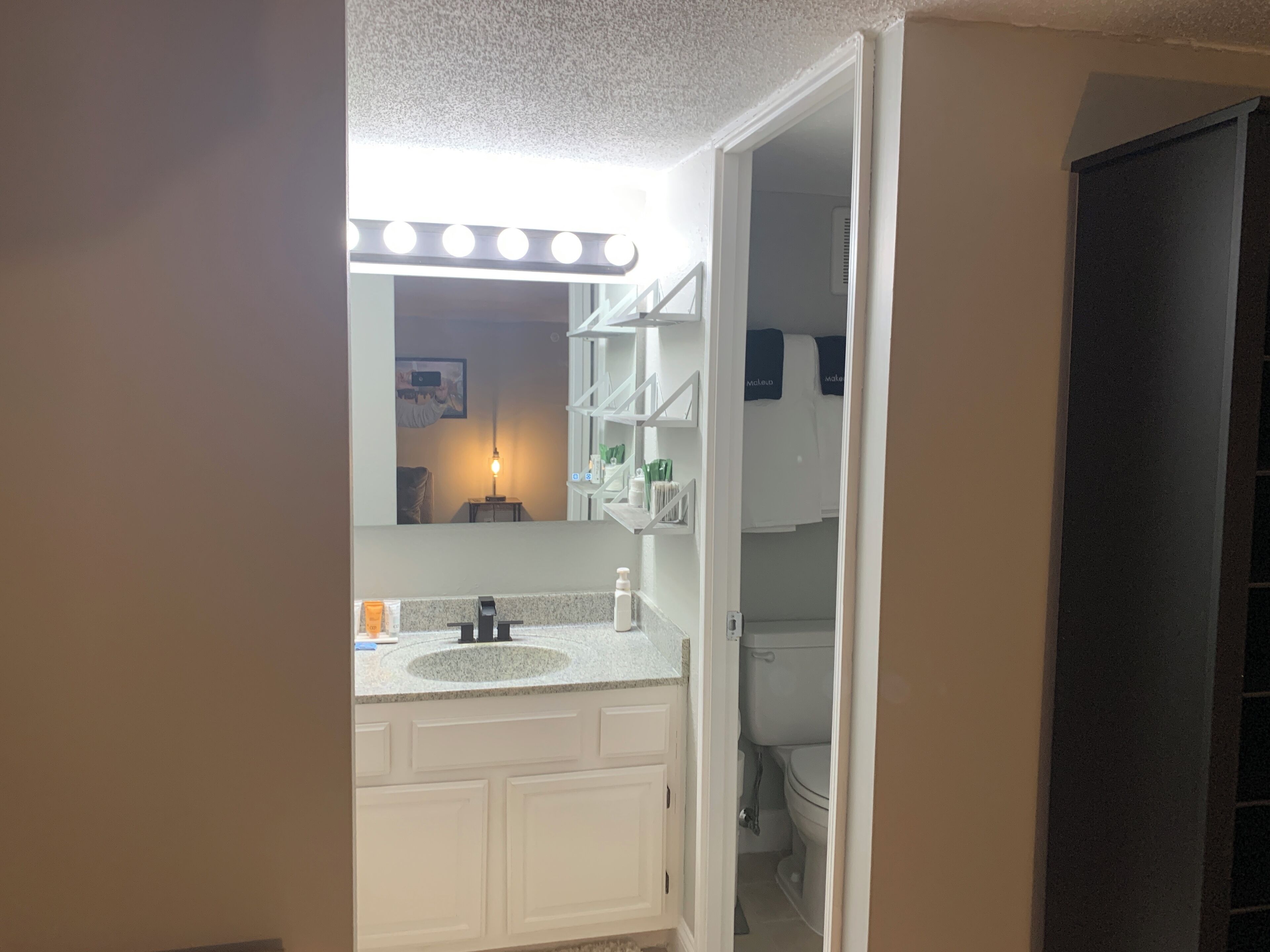 Hair dryer, towels, soap, shampoo