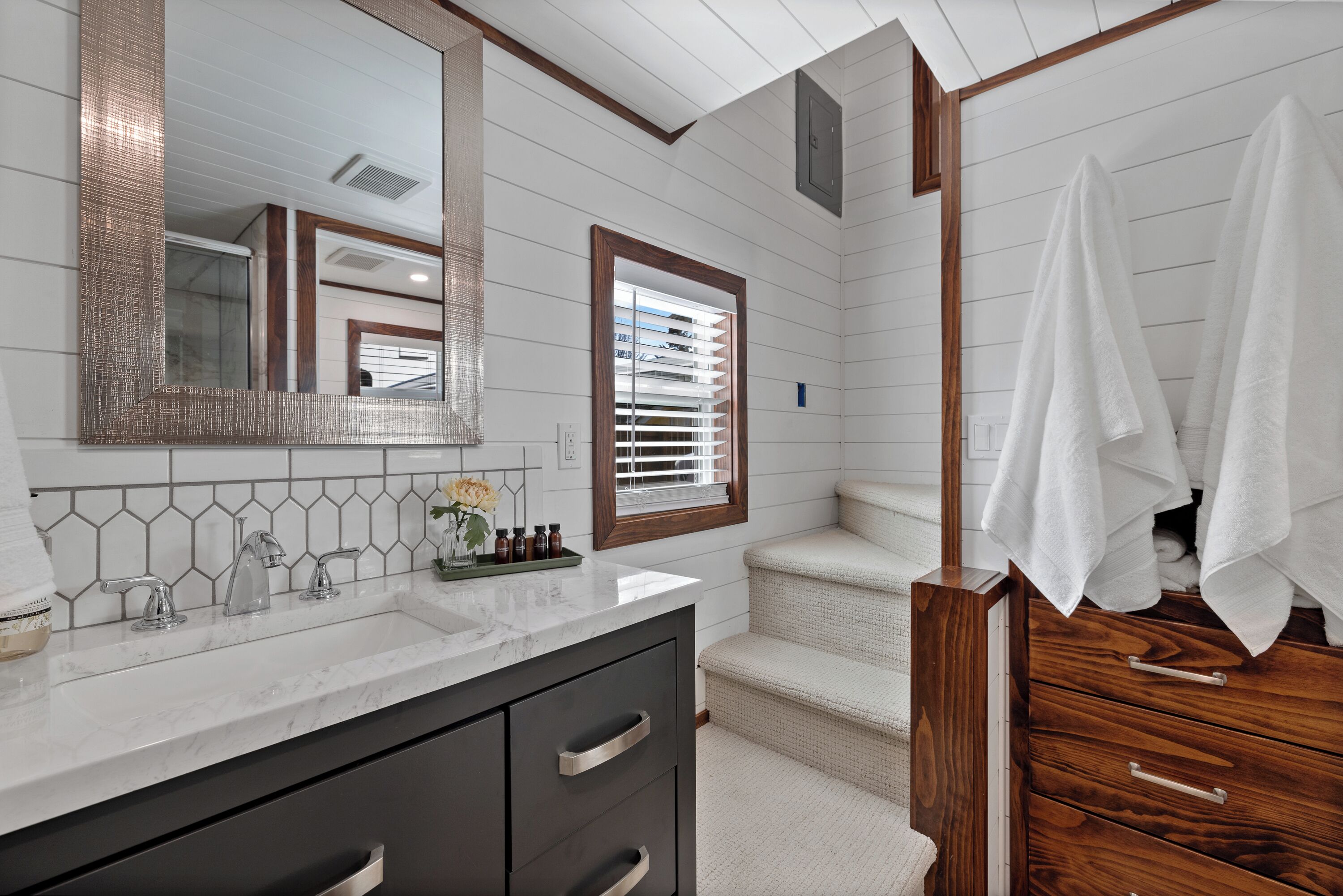 Shower, towels, soap, toilet paper