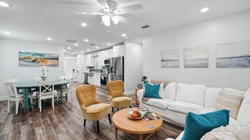 Smart TV, fireplace, books, printers
