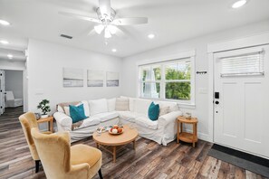 Smart TV, fireplace, books, printers
