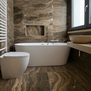 Shower, hair dryer, bidet, towels