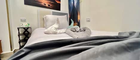 Quarto solteiro standard | Frigobar, cortinas blackout, quartos à prova de som