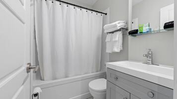 Hair dryer, towels, soap, shampoo
