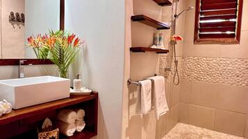 Shower, hair dryer, towels, soap