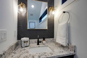 Hair dryer, towels, soap, toilet paper