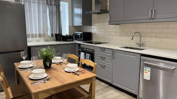 Apartment | Private kitchen | Fridge, microwave, oven, stovetop