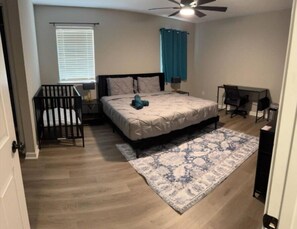 Desk, travel cot, WiFi, bed sheets