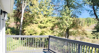 Rustic Charm Meets Modern Comfort 3-Bedroom Raised-Ranch Cottage in Wooded Area