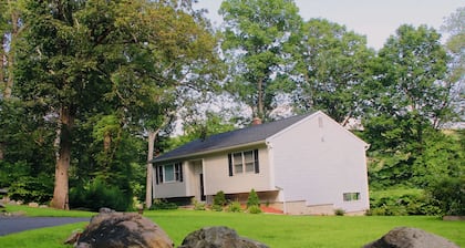 Rustic Charm Meets Modern Comfort 3-Bedroom Raised-Ranch Cottage in Wooded Area