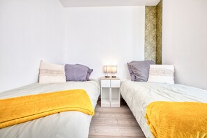 2 dormitorios, tabla de planchar con plancha, wifi gratis y ropa de cama