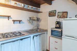 Fridge, stovetop, coffee/tea maker, toaster