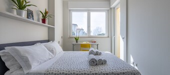 Elegant Seaside Apartment with Pool and Parking