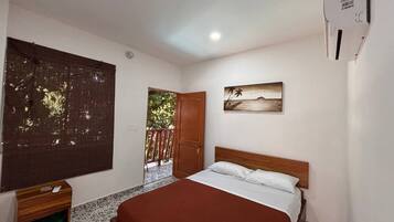 Comfort kamer, uitzicht op tuin | Beddengoed